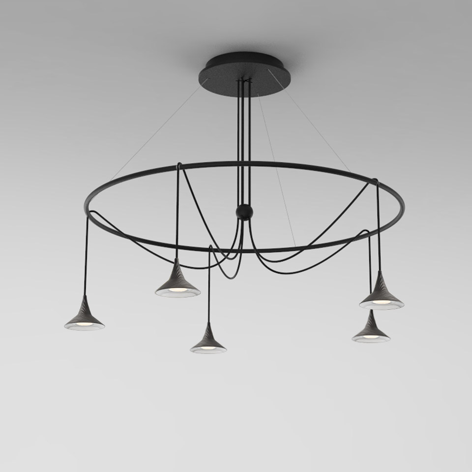 Lampadario Artemide Unterlinden: anello circolare nero con cinque faretti LED a sospensione su cavi regolabili da rosone centrale a soffitto