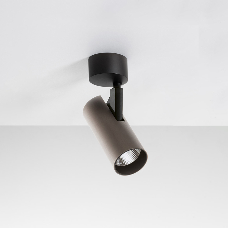 Artemide Vector Ceiling spotlight in black, adjustable cylindrical LED head mounted on ceiling base, directional accent lighting