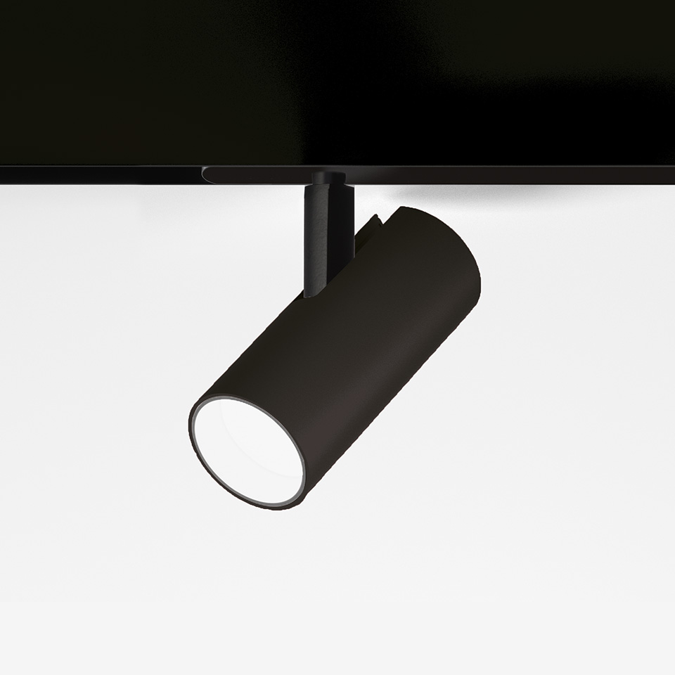 Faretto da binario Artemide Vector Magnetic nero opaco, corpo cilindrico, testa orientabile montata su sistema a binario magnetico