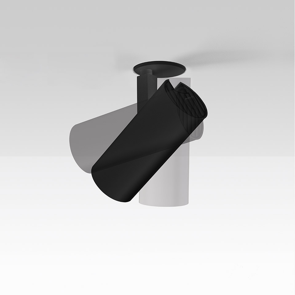 Faretto da incasso a soffitto Artemide Vector Recessed in nero, con corpo cilindrico e testa ruotata, inclinato per illuminazione direzionale.
