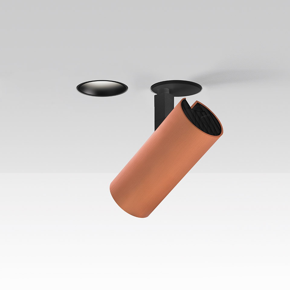 Faretto da incasso Artemide Vector: testa cilindrica orientabile color terracotta su supporto nero a soffitto, mostrato con versione senza cornice