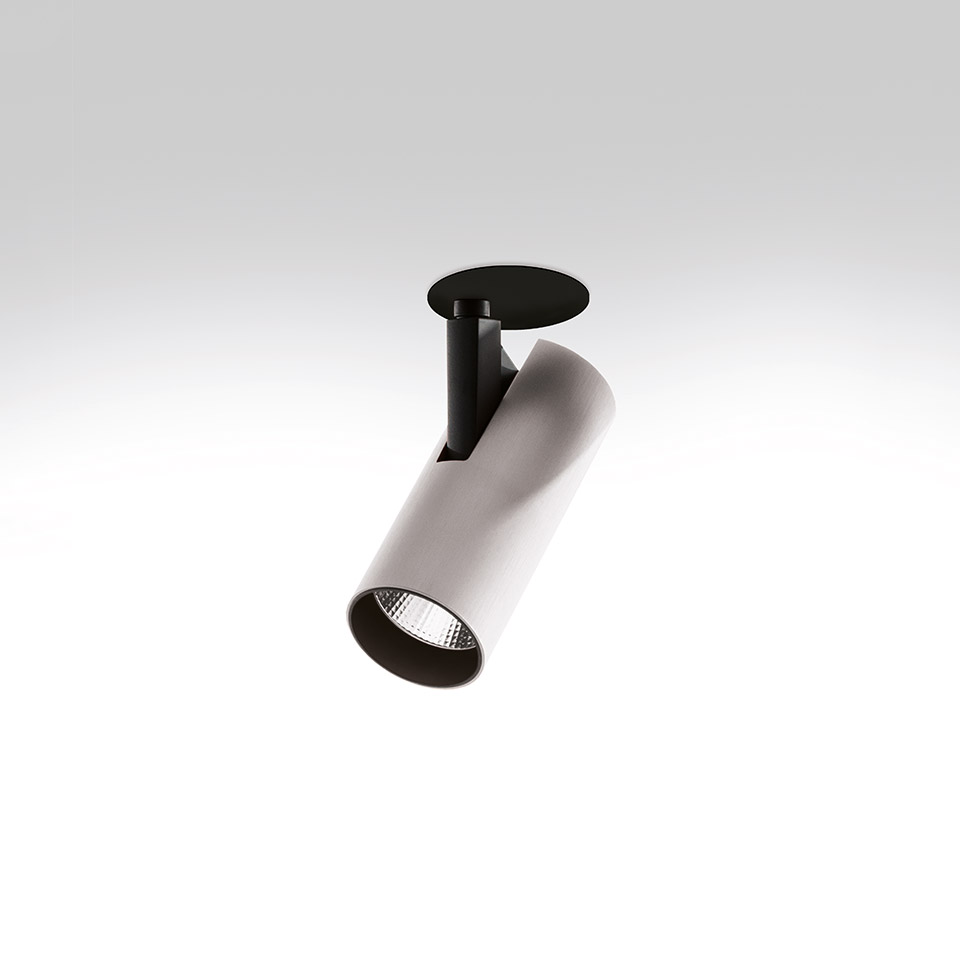 Artemide Vector Semirecessed spotlight: white cylindrical adjustable LED fixture with black recessed ceiling mount, tilted at an angle