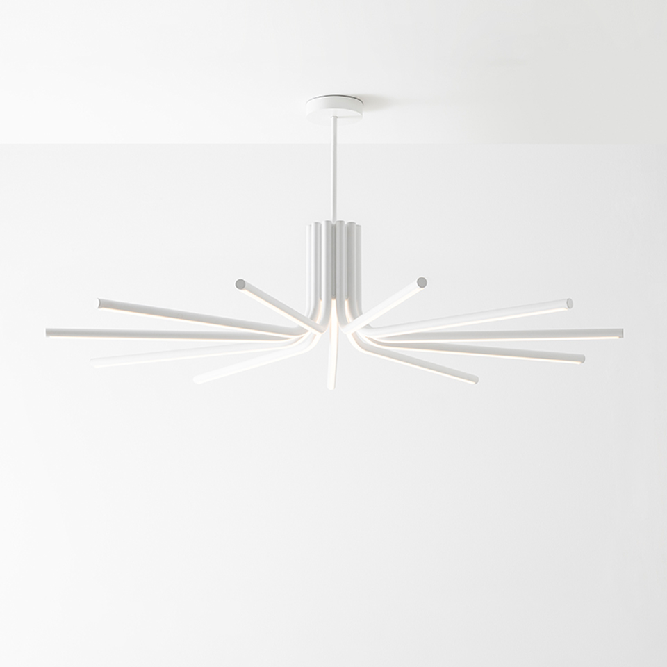 Artemide Veil pendant lamp in white, featuring multiple radiating LED tubes from a central cylindrical body, suspended from ceiling
