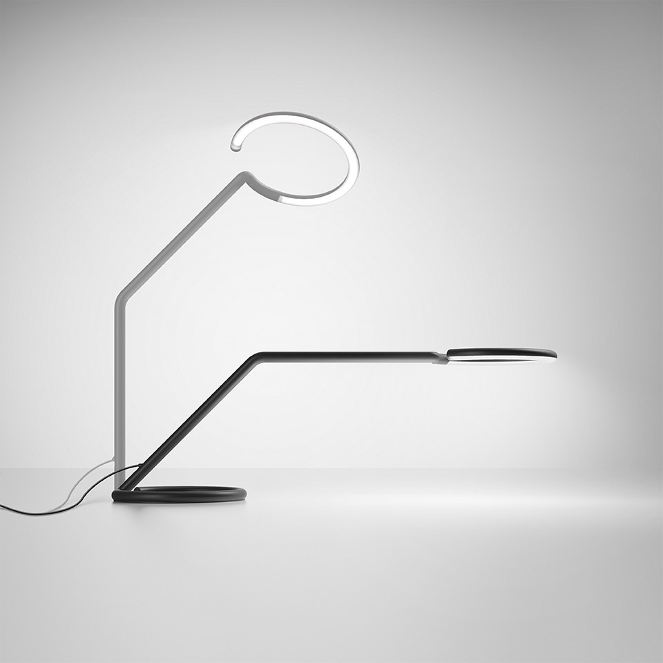 Two Artemide Vine Light desk lamps: white with circular LED ring head, black with elongated horizontal arm, both on round bases - 2