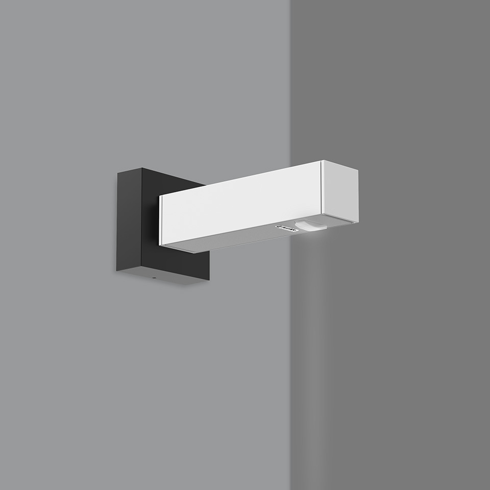 Artemide Walking Parete wall lamp: rectangular white LED body on black square base, mounted on corner wall, directional light