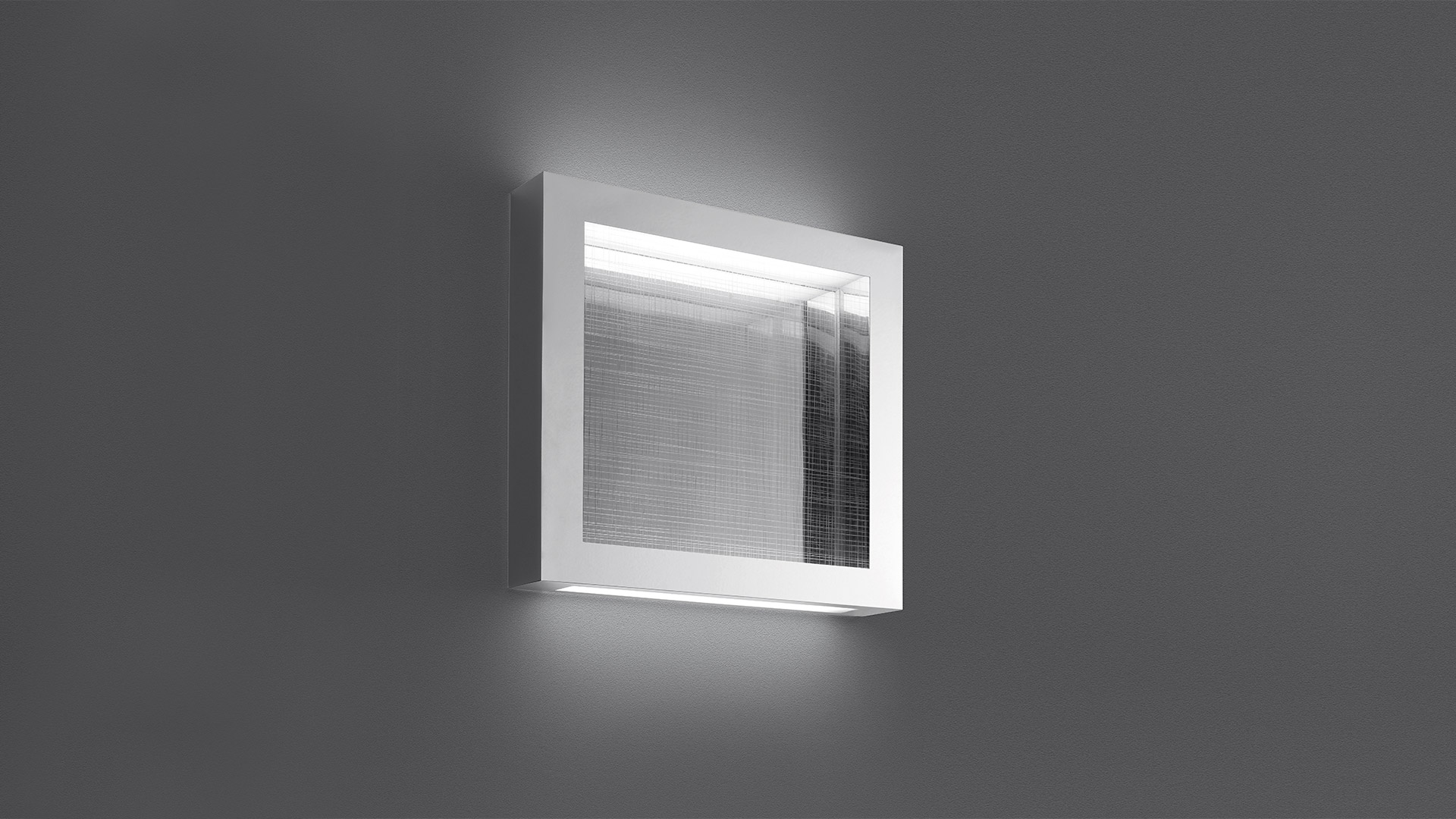 Artemide Altrove wall/ceiling lamp: square white frame with textured mesh diffuser emitting soft indirect light on surrounding wall