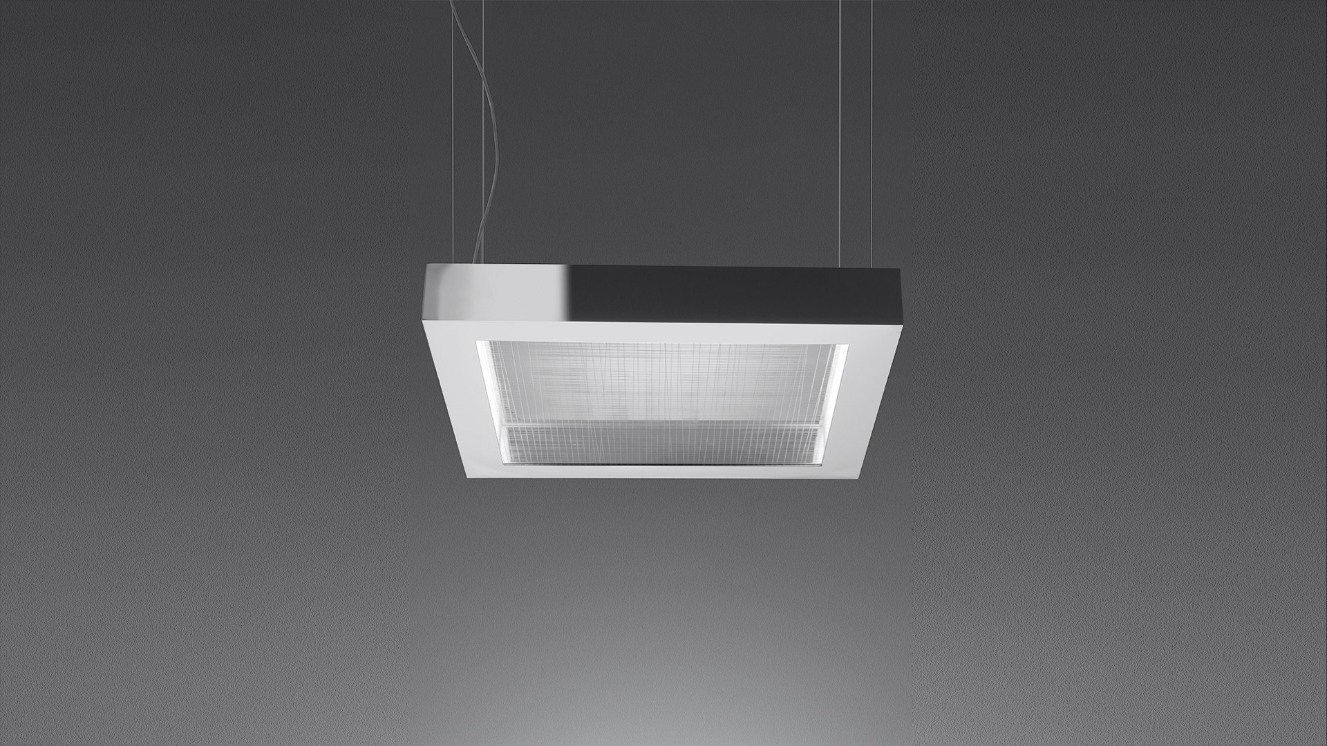 Artemide Altrove Sospensione: lampada a sospensione quadrata bianca e nera con diffusore strutturato che emette luce indiretta calda, sospesa da sottili cavi