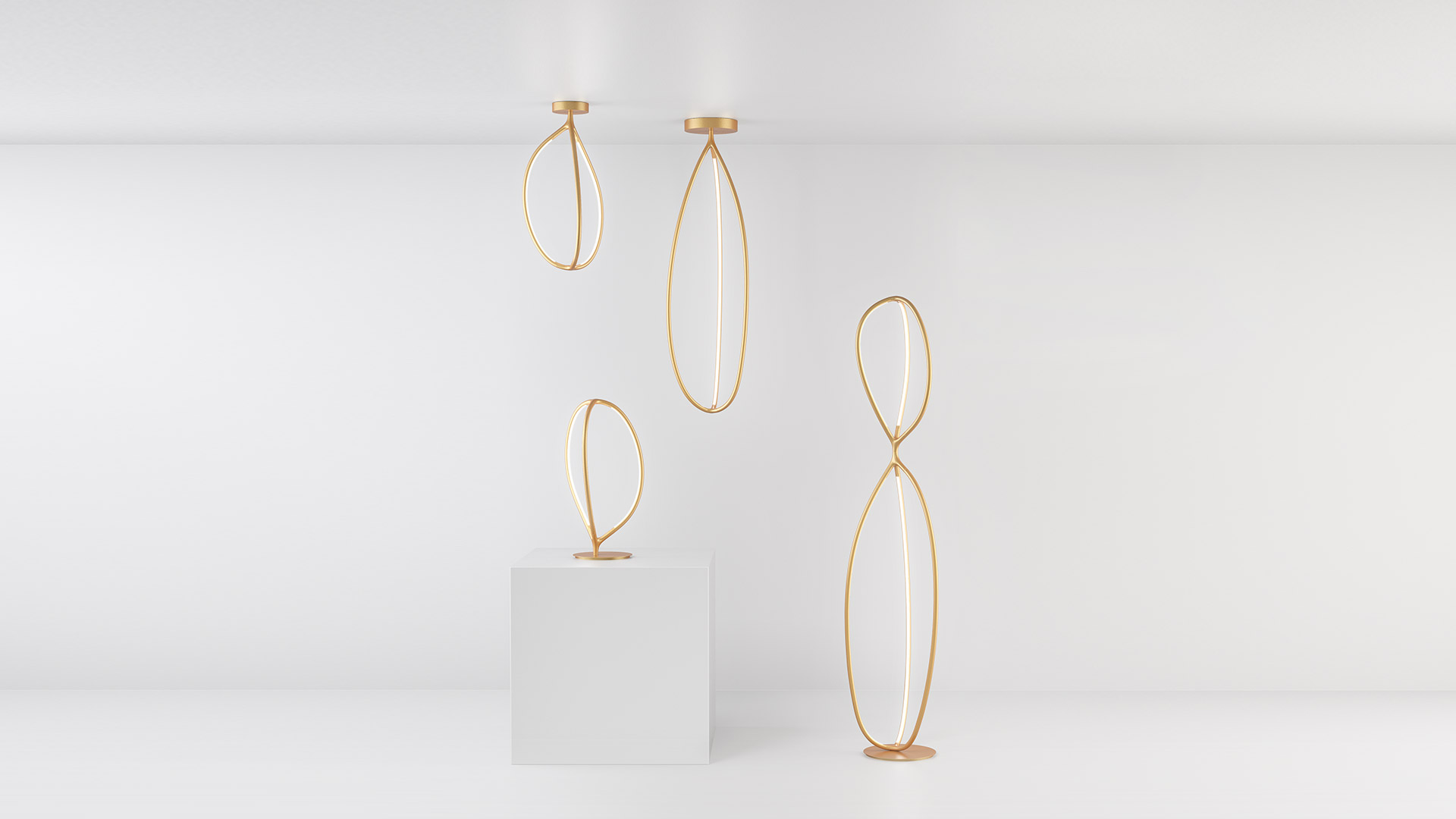 Collezione Artemide Arrival: lampade LED ad anello ovale dorato nelle versioni a sospensione, da tavolo e da terra su sfondo bianco