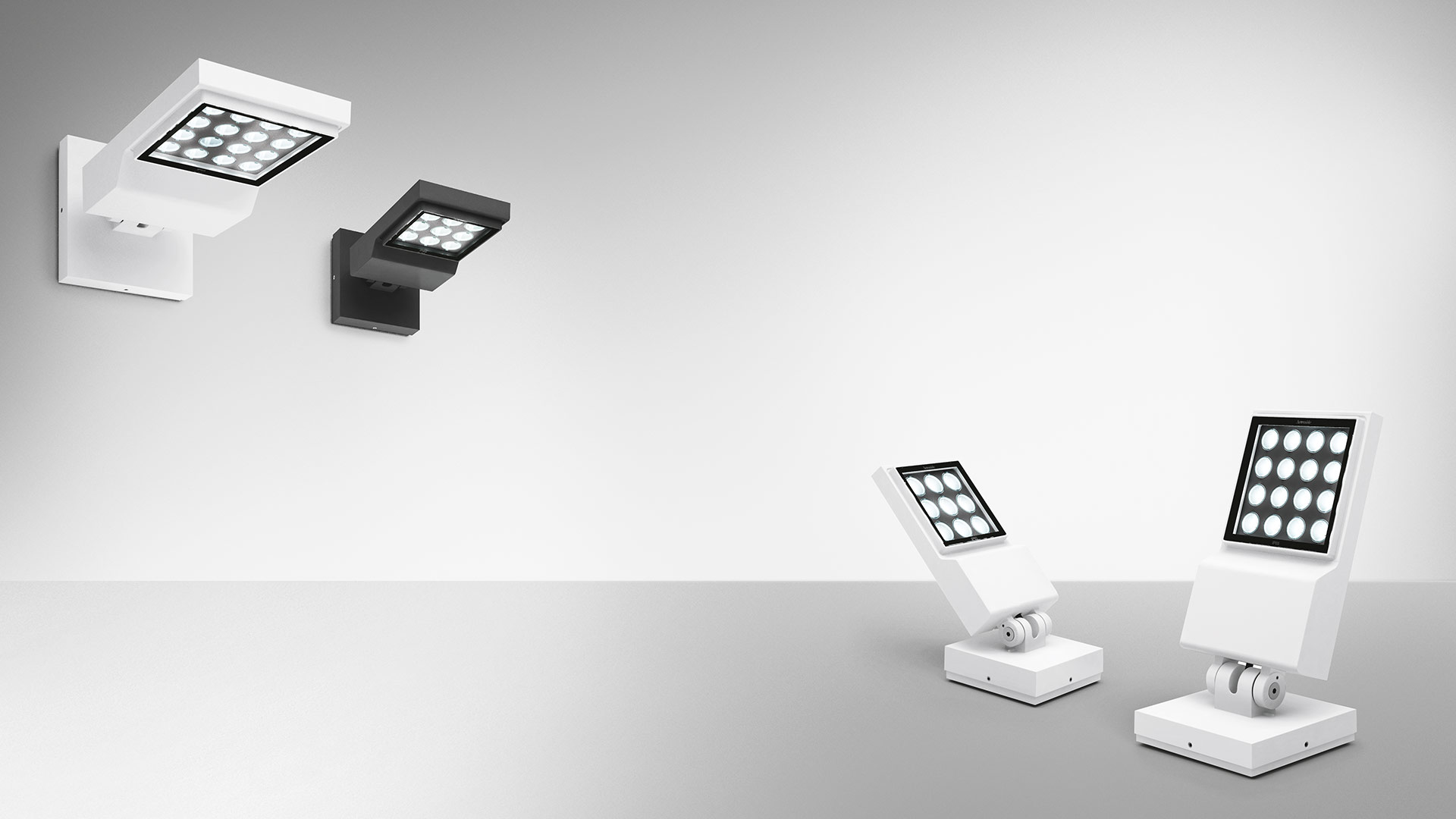 Lampade da parete e da terra Artemide Cefiso LED in bianco e nero, con teste quadrate regolabili e matrici LED multiple