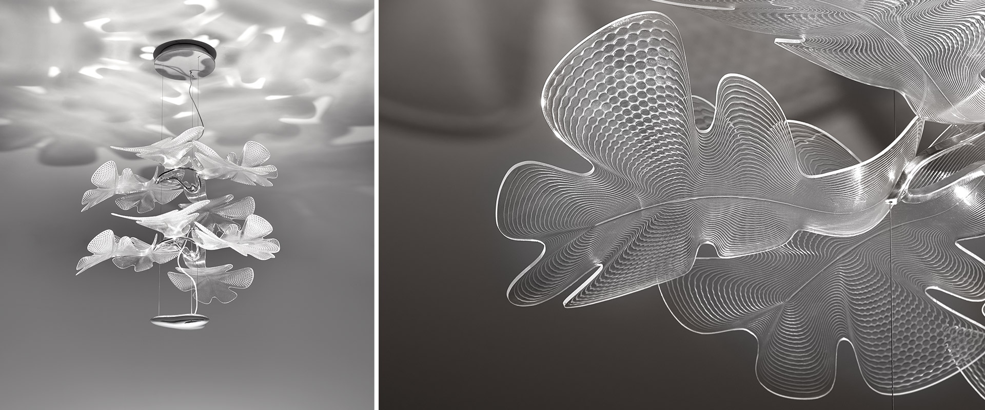 Lampada a sospensione Artemide Chlorophilia 2: lampadario a livelli con diffusori bianchi traslucidi a forma di foglia disposti come un albero, su sfondo rosso