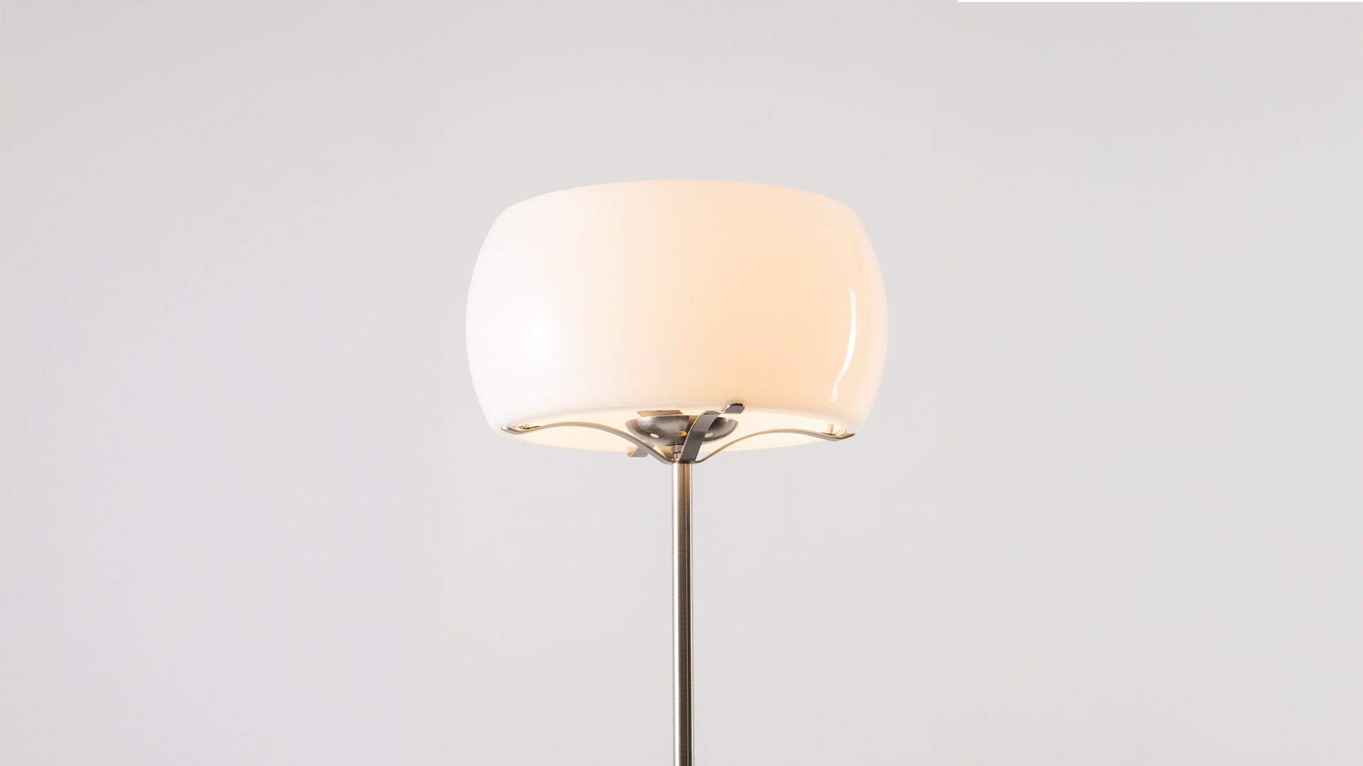 Artemide Clitunno lamps: floor lamp with chrome stem and pendant lamp, both featuring rounded white opal glass shades
