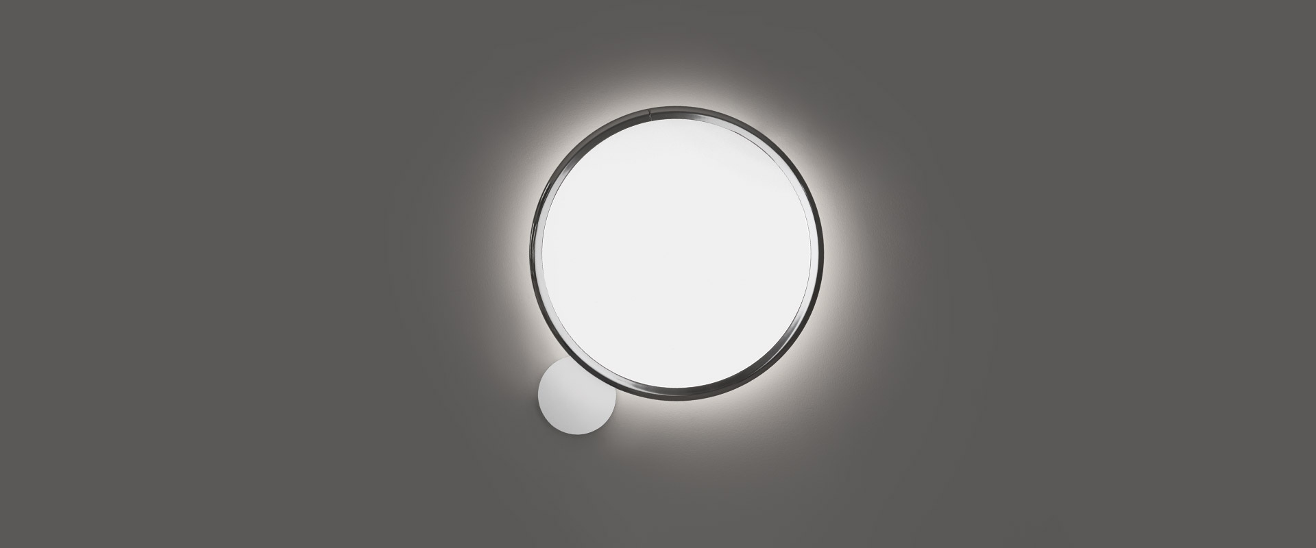 Artemide Discovery pendant lamp: large oval diffuser in white opal glass with slim black metal frame, emitting warm upward light