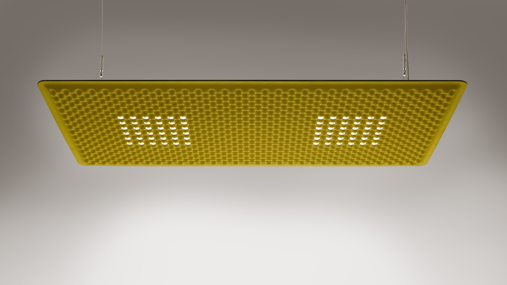 Close-up of Eggboard Matrix panel corner, showing layered construction: padded fabric top, acoustic felt, and black frame with glass.