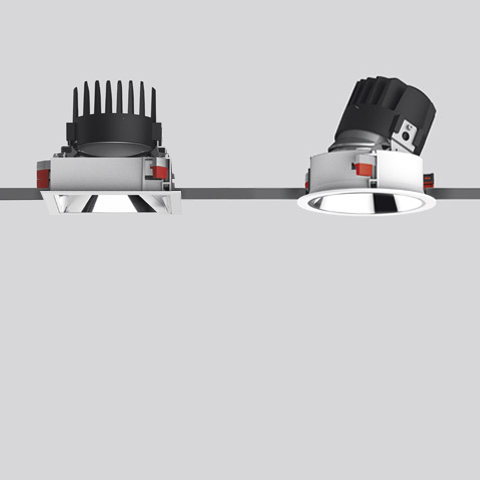 Artemide Everything 150 Trim recessed spotlights: left square fixed downlight, right round adjustable tilting version, both with chrome trim