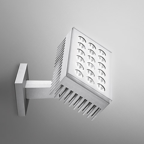 Artemide Falange 18 wall-mounted LED spotlight in silver aluminum, featuring a square head with 18 LEDs and finned heat sink on a bracket