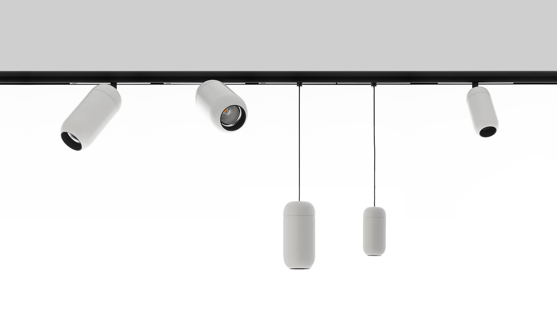 Faretto su binario Artemide Gople System: corpo cilindrico bianco con sorgente LED calda, montato su binario nero con testa orientabile