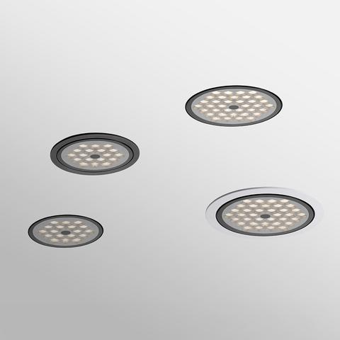 Quattro faretti da incasso LED Artemide Helgoland IP44 in due dimensioni, con cornici scure e bianche, con griglia LED a nido d'ape