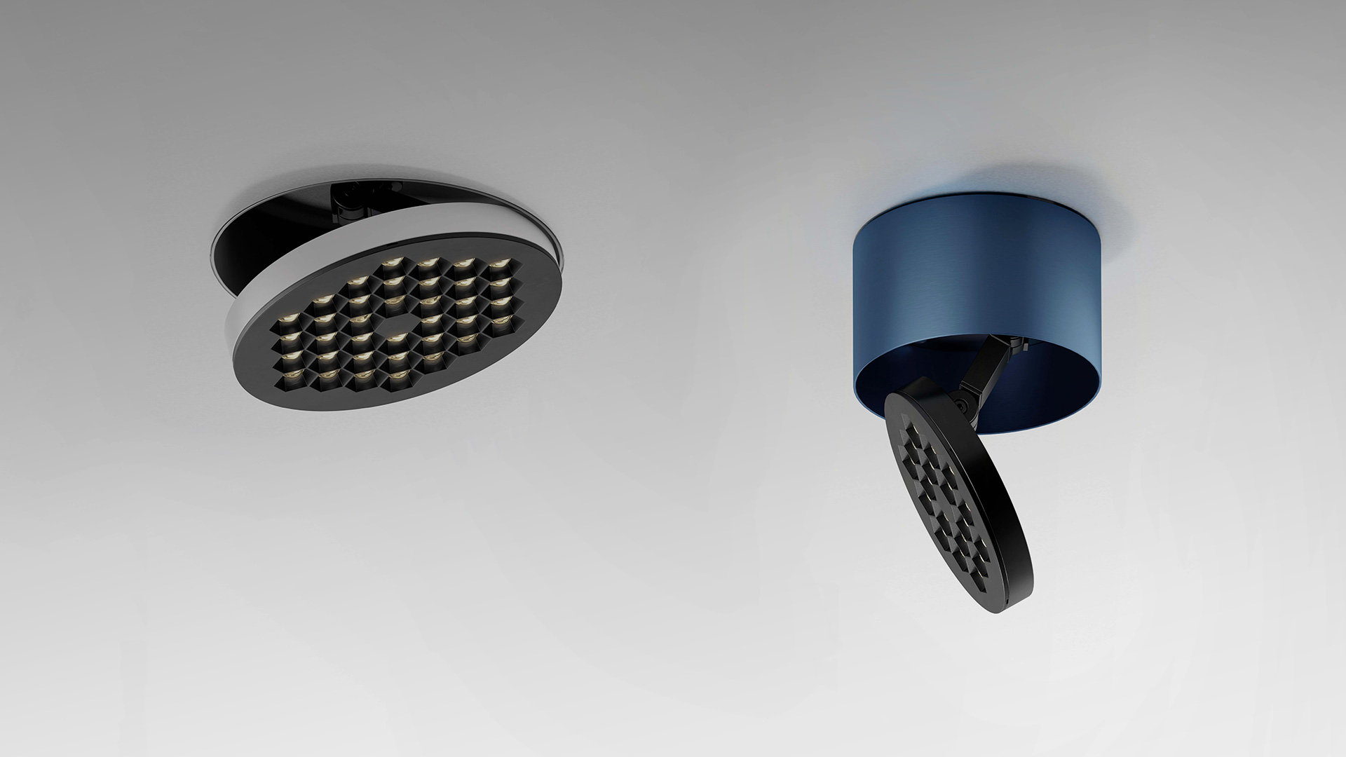 Faretto da incasso orientabile Artemide Helgoland Adjustable, corpo circolare nero con array LED, meccanismo di orientamento e clip di montaggio rosse