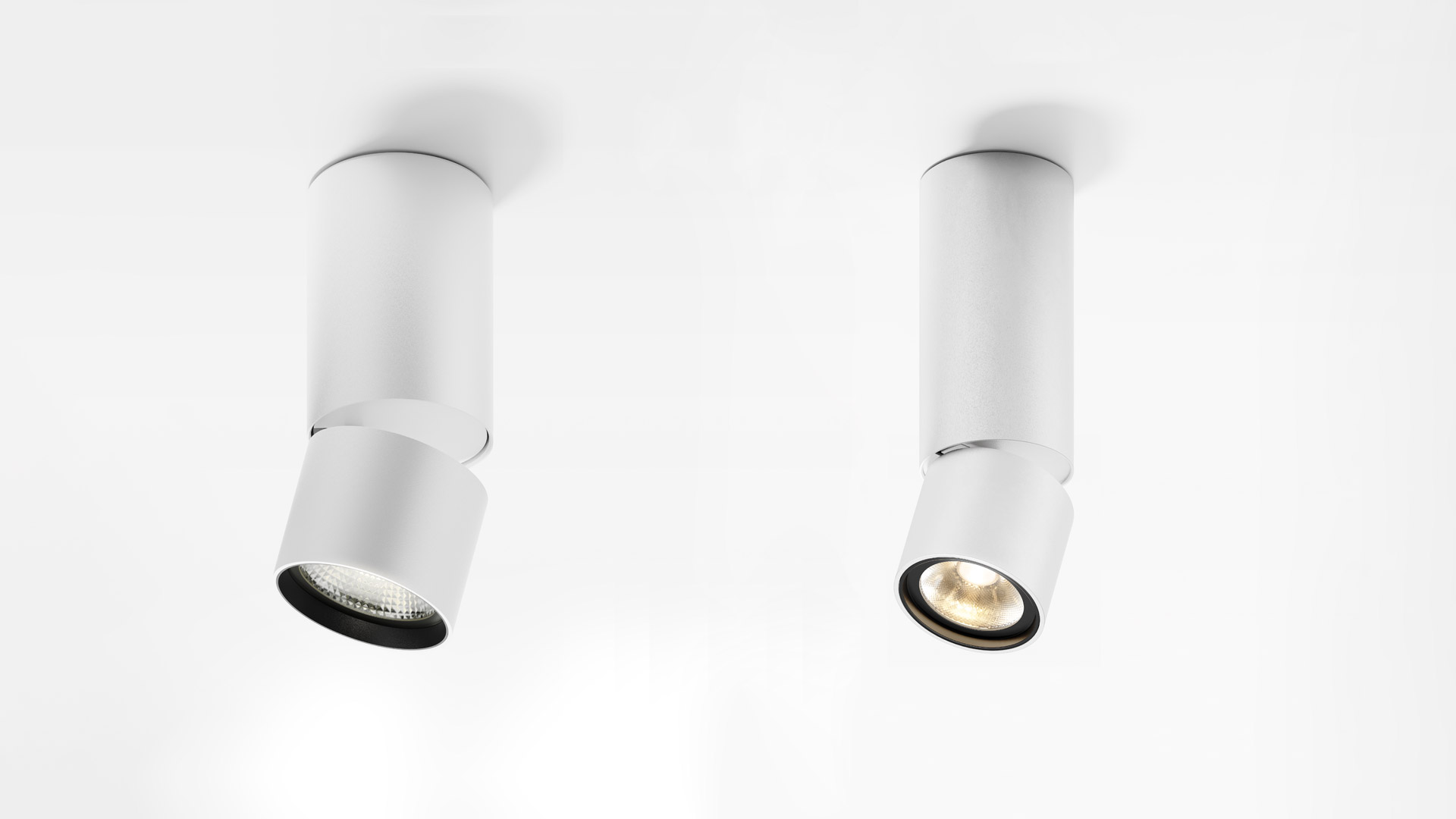 Quattro faretti da soffitto Artemide Hoy Spot SMD neri in diverse orientazioni: verso il basso, inclinato, a parete e ruotato
