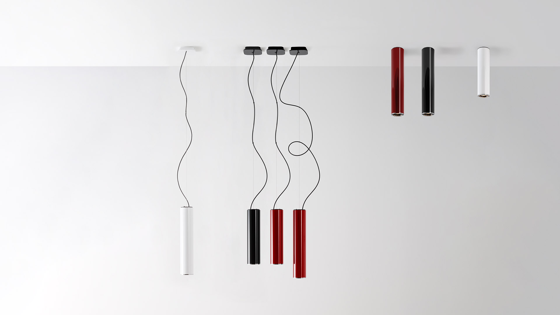 Artemide Ilio lamp base: white cylindrical body with black top cap and curved dark power cord extending upward