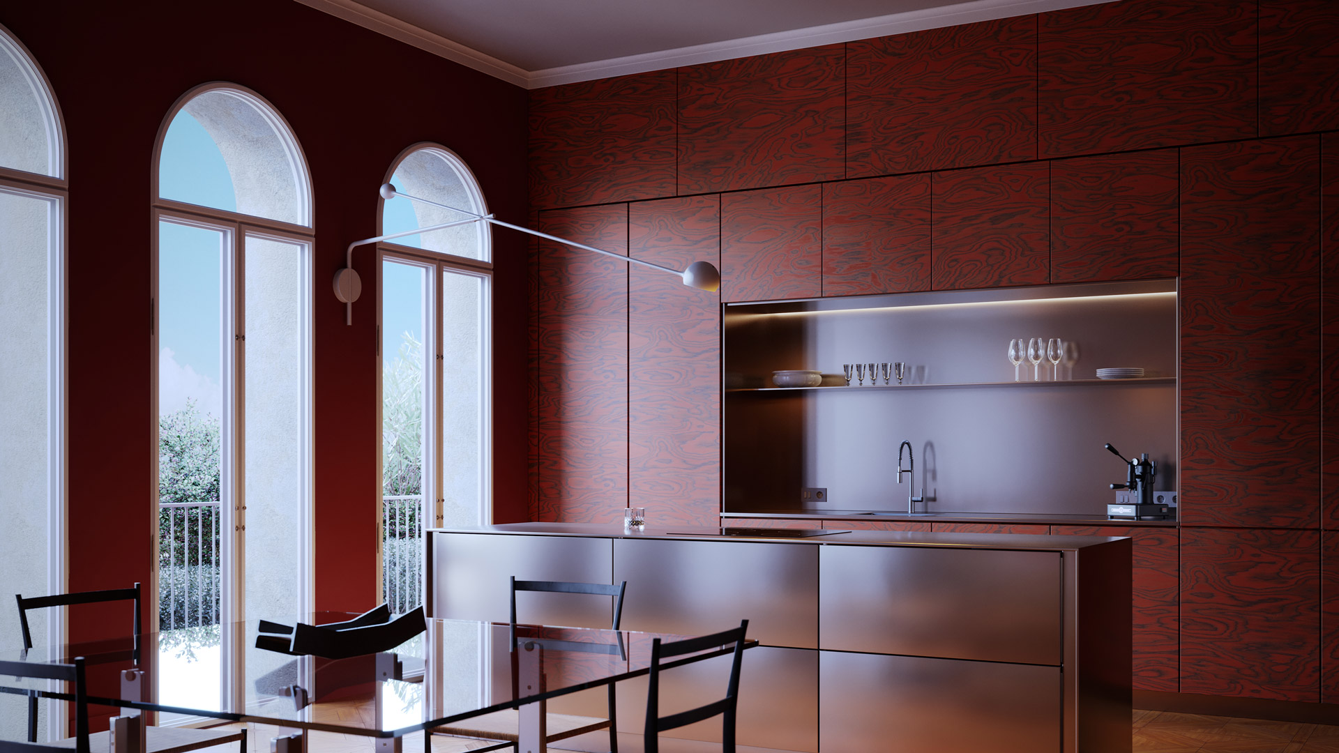 Mano che regola la testa sferica grigio scuro della lampada Artemide Ixa, con il giunto magnetico rimovibile su braccio curvo
