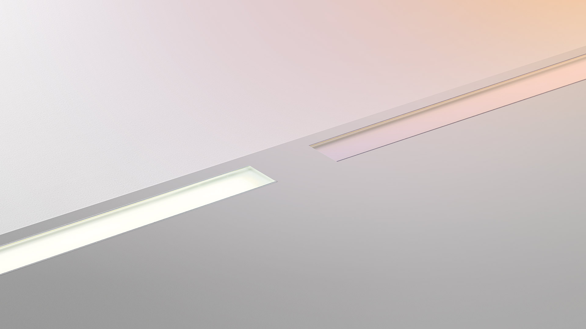 Artemide LineaLed Drive-over: two recessed linear LED ceiling fixtures flush-mounted, one illuminated emitting warm white light