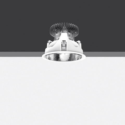 Artemide Luceri Round Trim LED recessed downlight with white circular trim, faceted reflector, and visible heat sink mounted in ceiling
