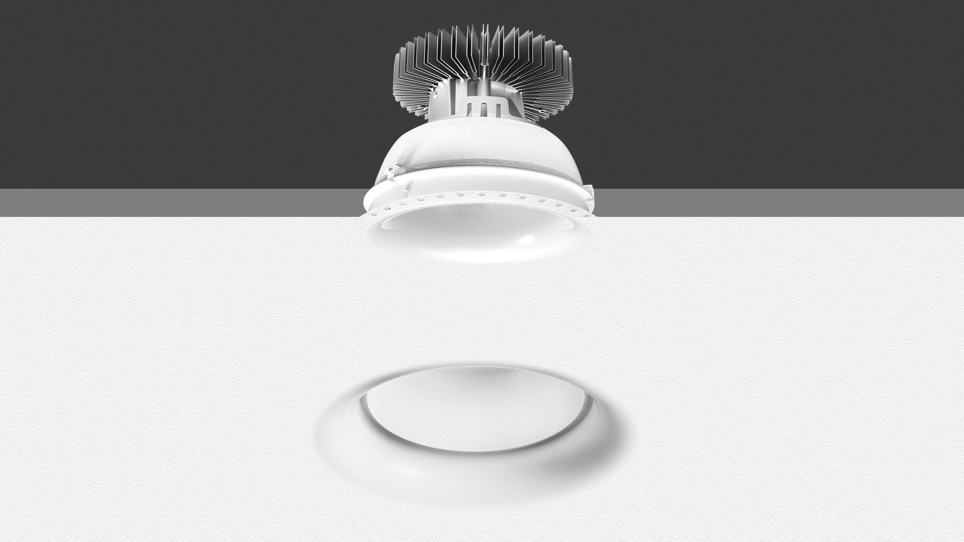 Artemide Luceri Round Trimless LED recessed ceiling downlight, white finish, flush frameless design with heat sink visible above