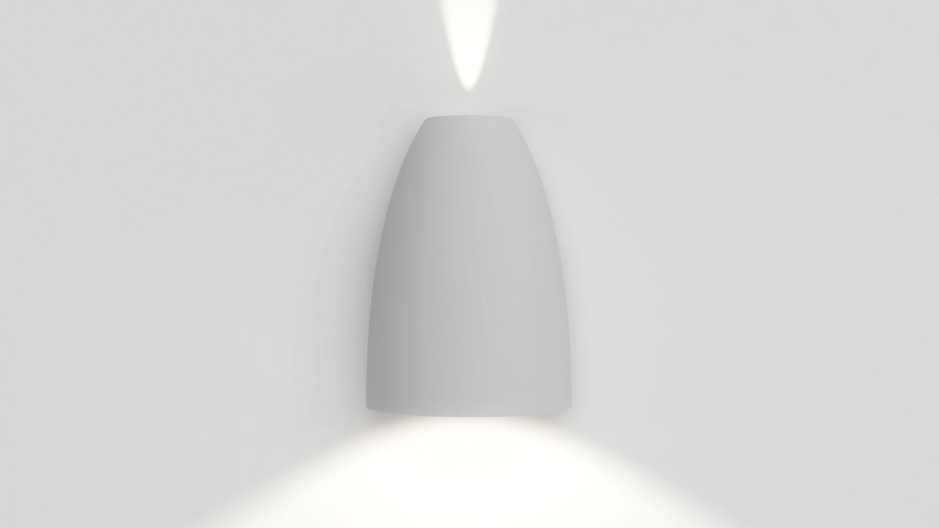 Applique Artemide Molla bianca, corpo a forma di proiettile che emette fasci di luce verso l'alto e il basso su parete bianca