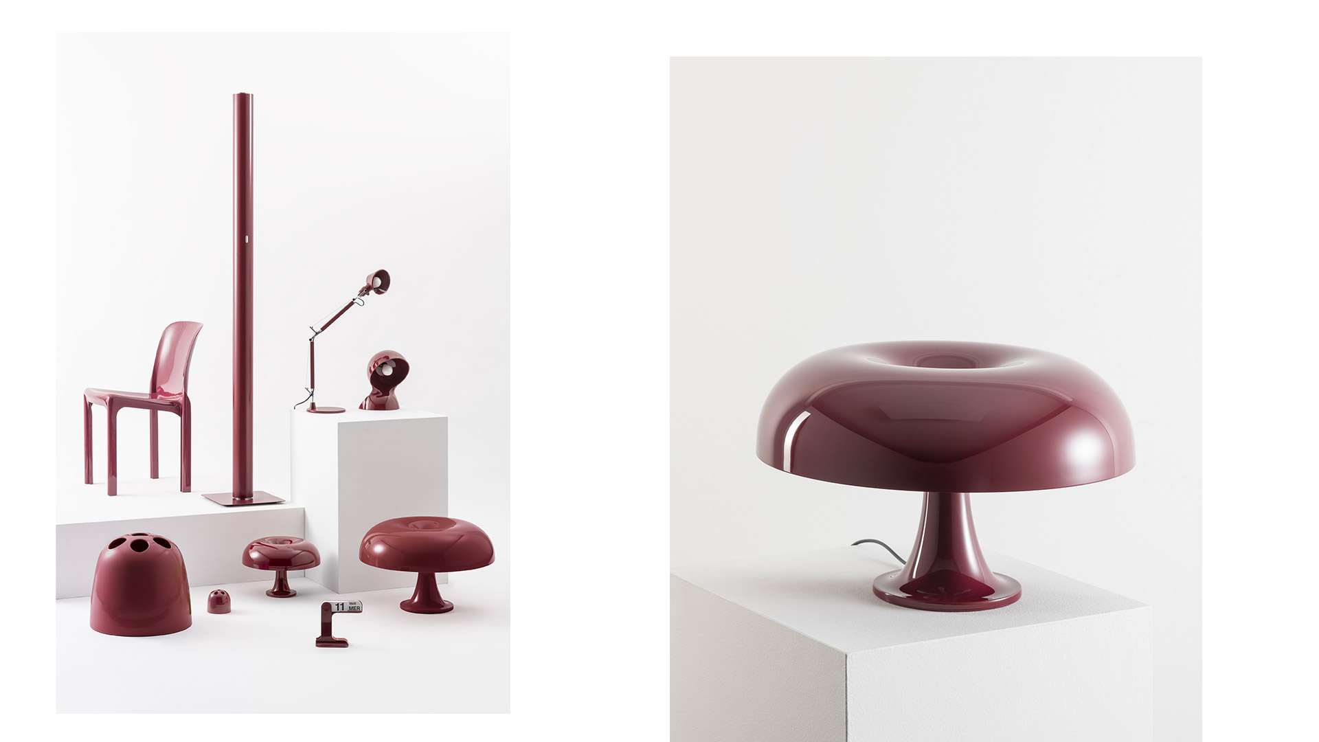 Lampada da tavolo Artemide Nesso con diffusore bianco a forma di fungo che irradia luce calda su una scrivania in legno accanto a rose bianche e libri