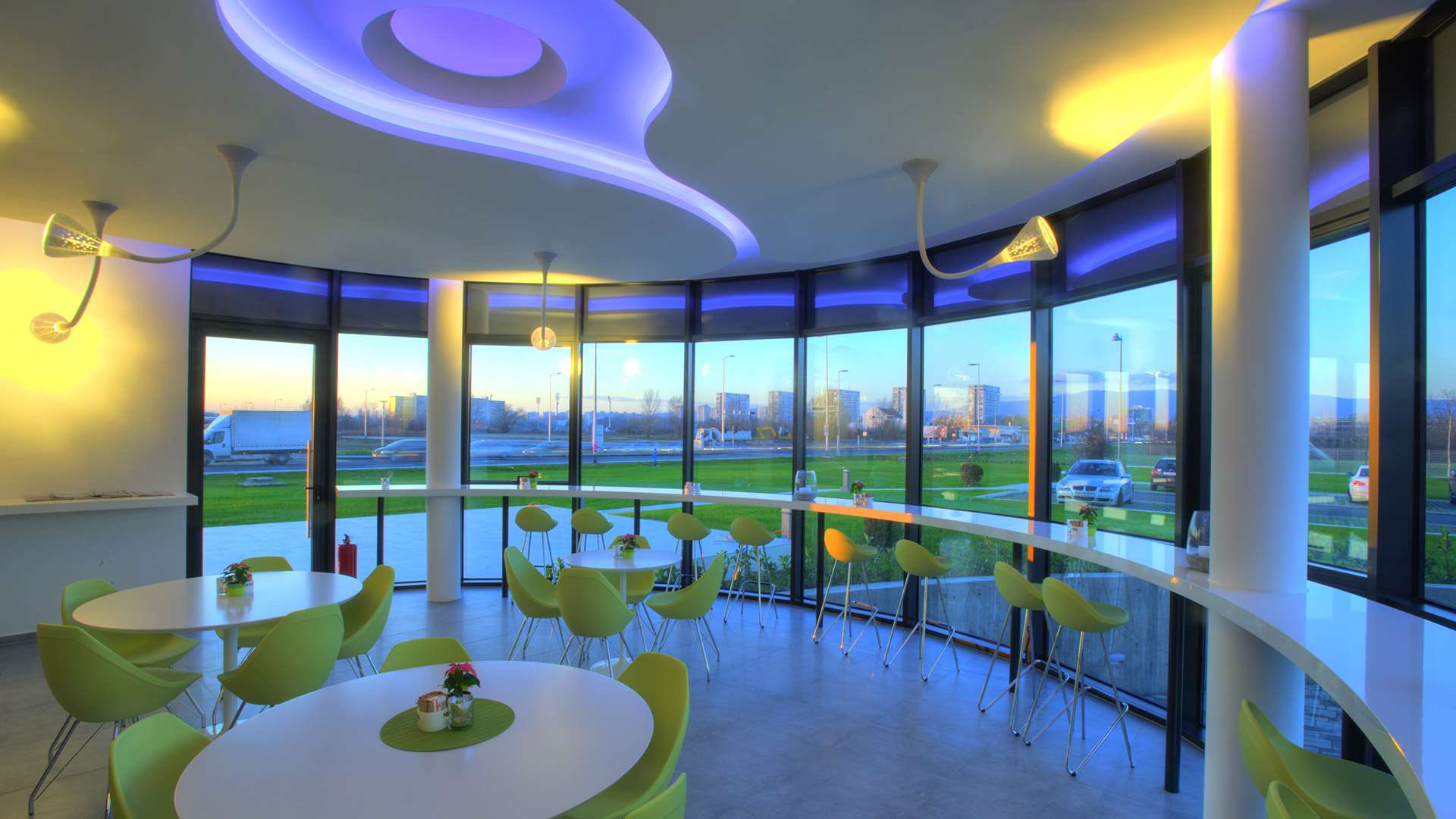 Artemide Pipe Suspension: single flexible white stem with cone shade (left) and five-arm version with decorative shades (right)