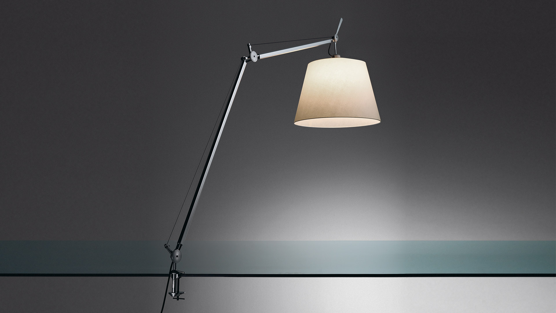 Artemide Tolomeo Mega Tavolo desk lamp with articulated aluminum arm, clamp base, and large white conical fabric shade