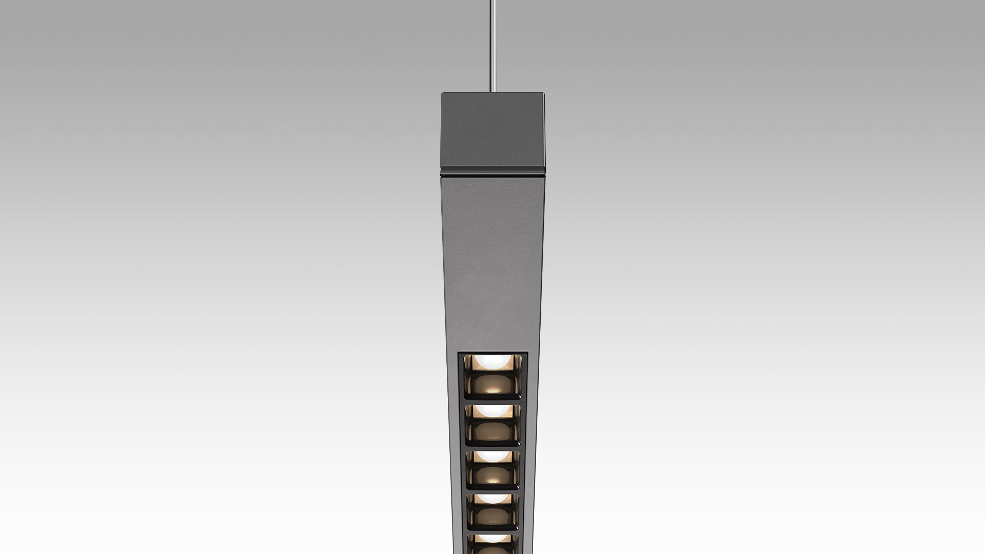 Lampada a sospensione Artemide Turn Around: corpo metallico scuro e sottile con striscia LED a lamelle, appesa con cavo a soffitto