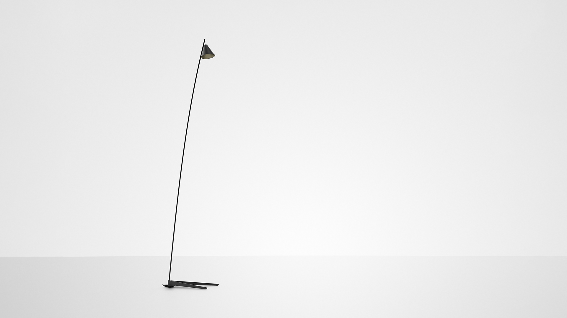 Lampada da terra Artemide Vea: sottile stelo nero inclinato in diagonale con piccolo paralume conico, su base a treppiede minimale