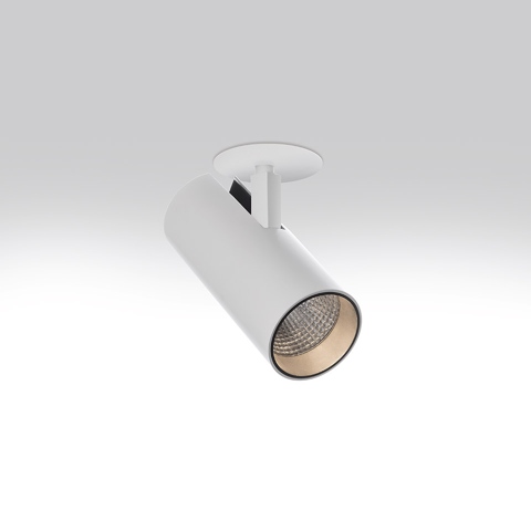 Artemide Vector Semirecessed spotlight: white cylindrical adjustable LED fixture with gold inner reflector, partially recessed in ceiling