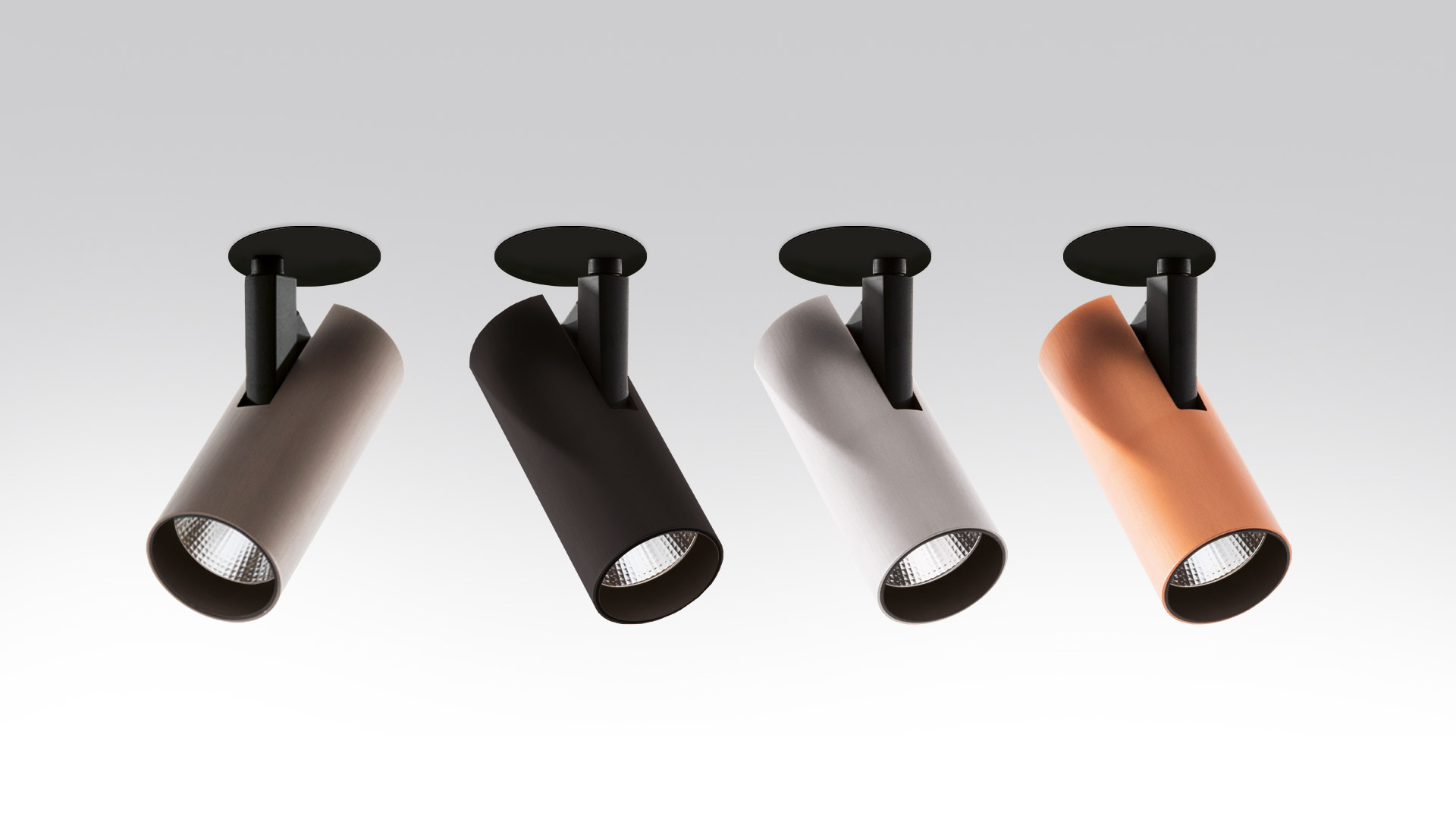 Four Artemide Vector Semirecessed spotlights in grey, black, white, and copper, featuring adjustable cylindrical heads for directional lighting.