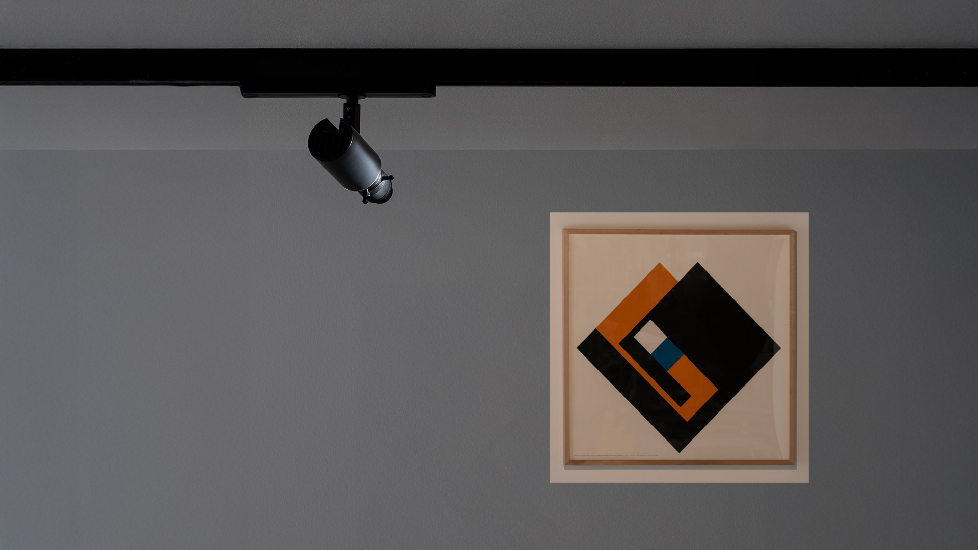 Artemide Vector Shaper spotlight in matte black, ceiling-mounted projector with adjustable lens barrel and side clips